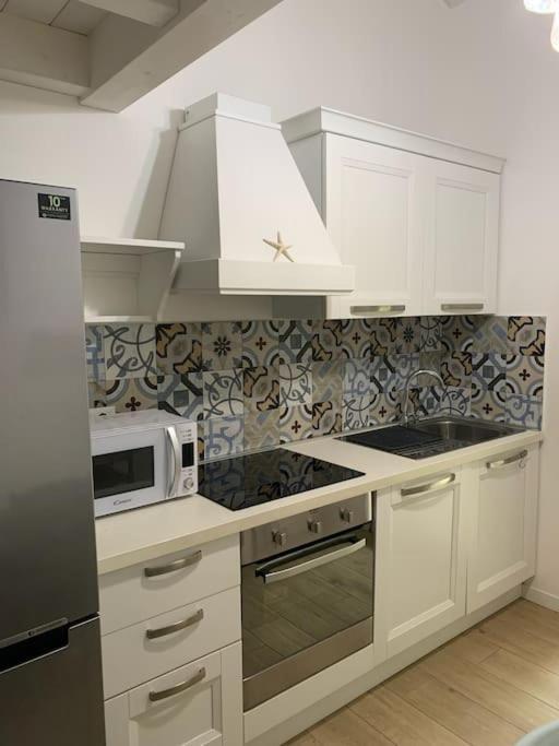 Residence Elegance Villa La Sterlizia Porto Pino Esterno foto